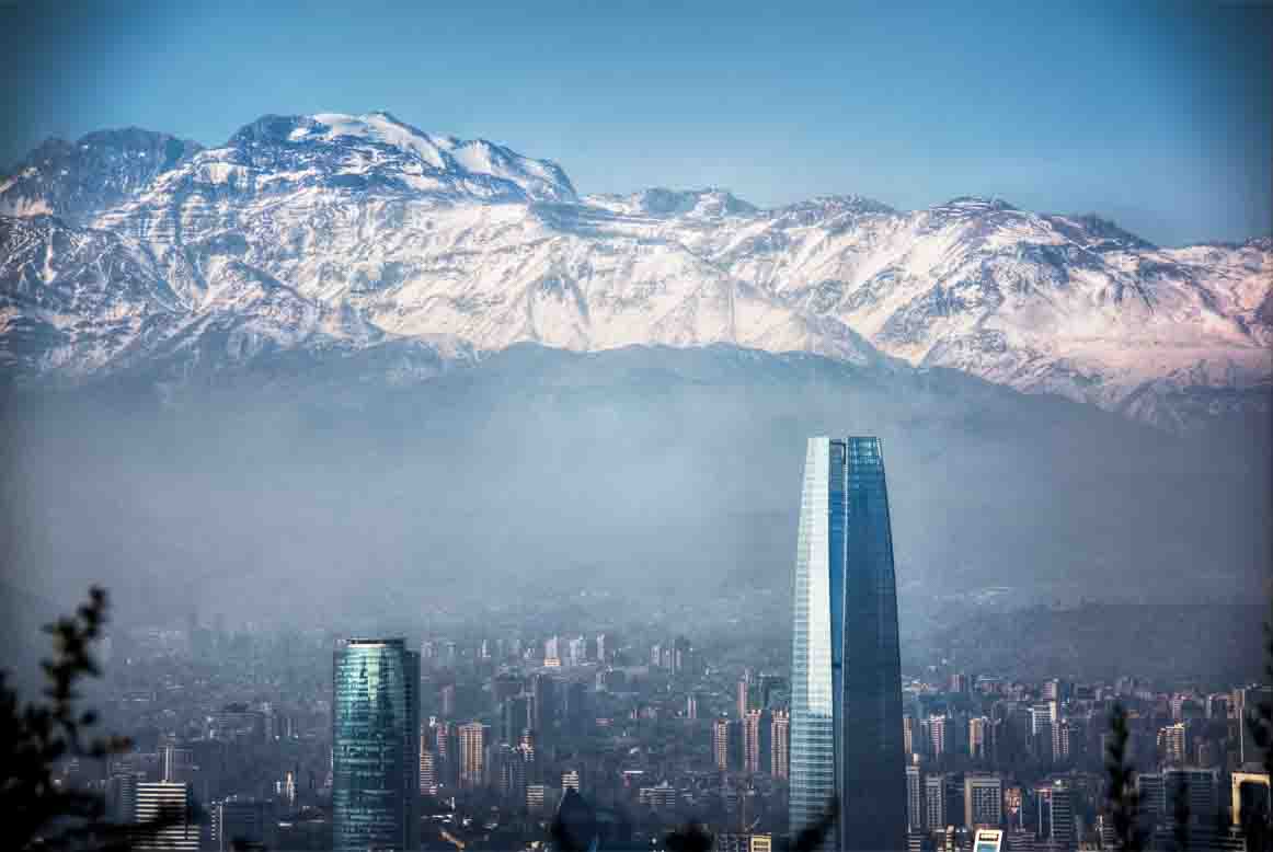 Santiago's Gran Torre skyscraper rising against the snow-capped Andes